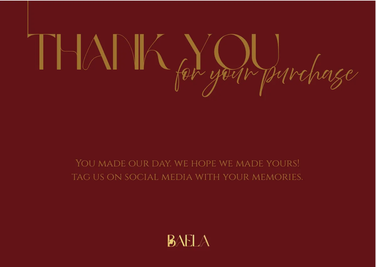The thank-you card: Thank you for your purchase in gold script, asking the customer to tag the brand with their memories.
