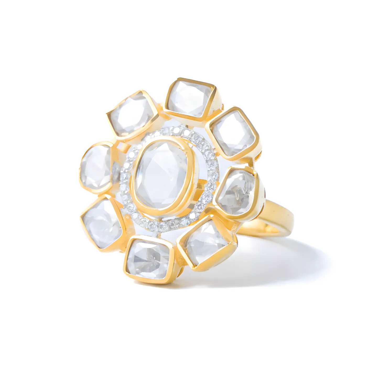 A Baela polki ring in gold setting, photographed on white at an angle so the stones catch the light.