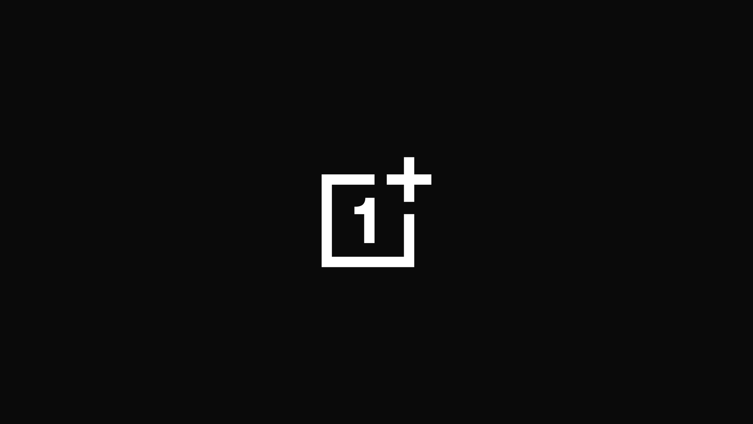 The OnePlus mark in white on near-black: a square outline containing the numeral 1, with a plus sign breaking out of the top right corner.