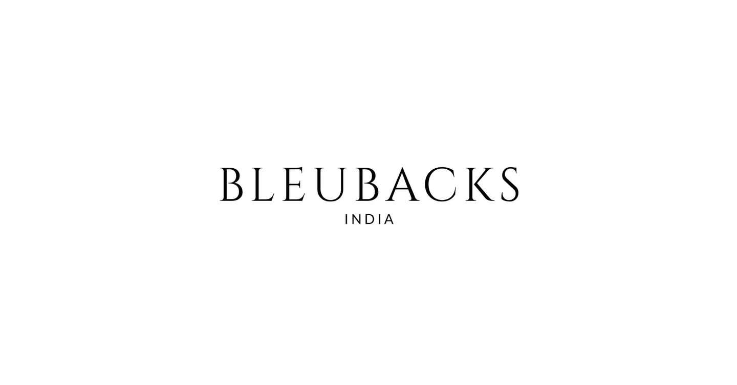 The Bleubacks wordmark in black on white: widely letterspaced serif capitals, with INDIA set smaller and centred beneath.
